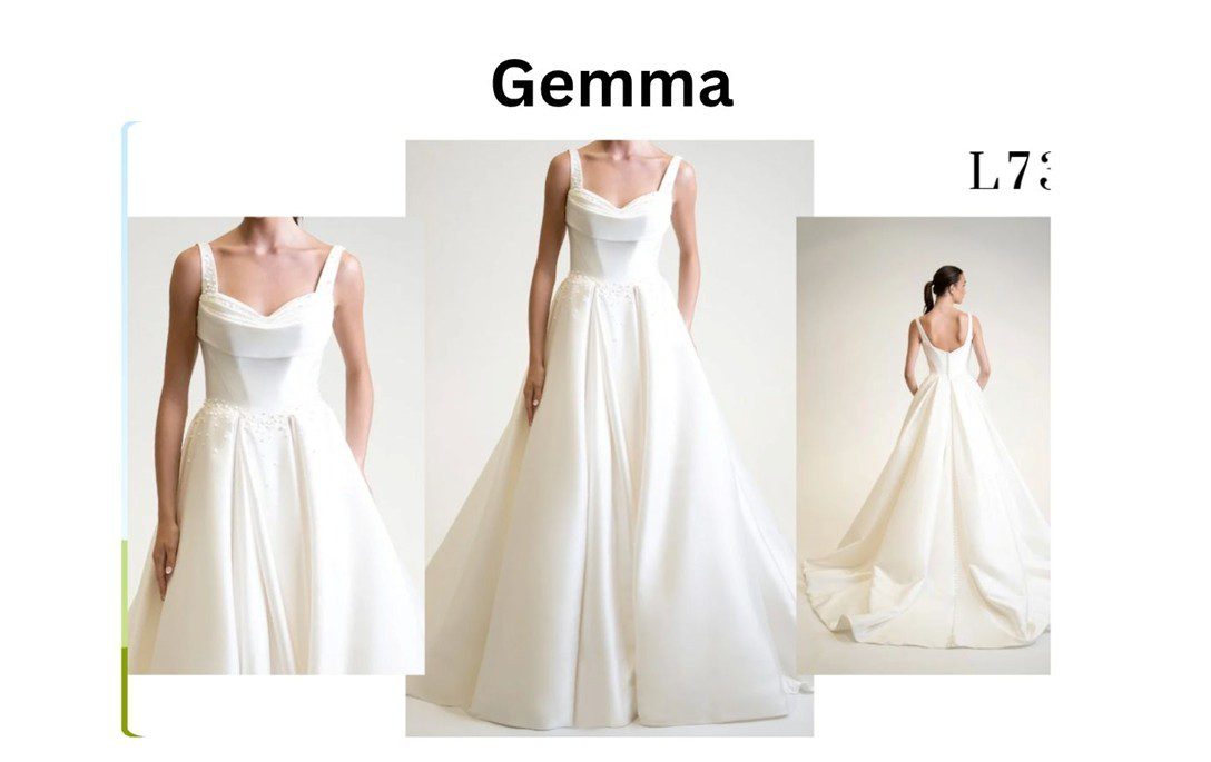 Elegant white wedding dress with a fitted bodice and flowing skirt.