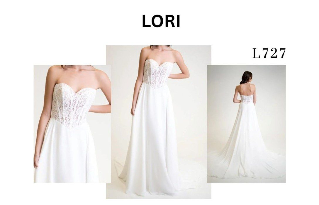 Elegant white wedding dress with lace bodice and flowing skirt.