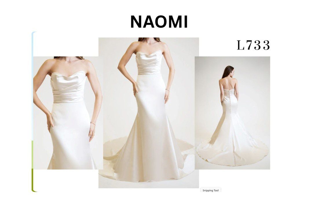 Elegant satin white wedding gown with a fitted silhouette and train.